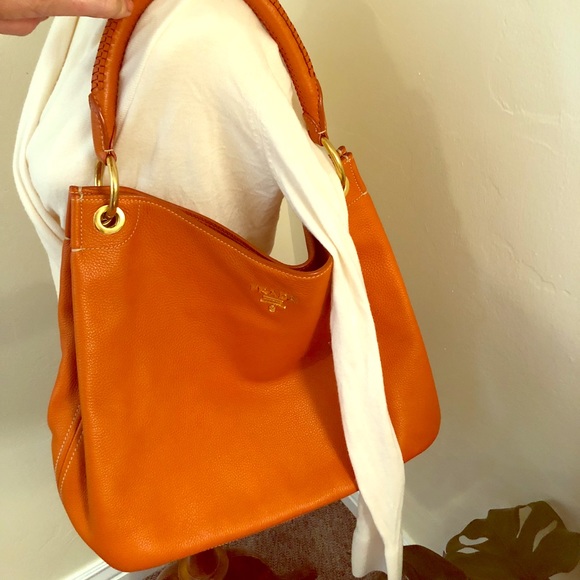 orange prada purse